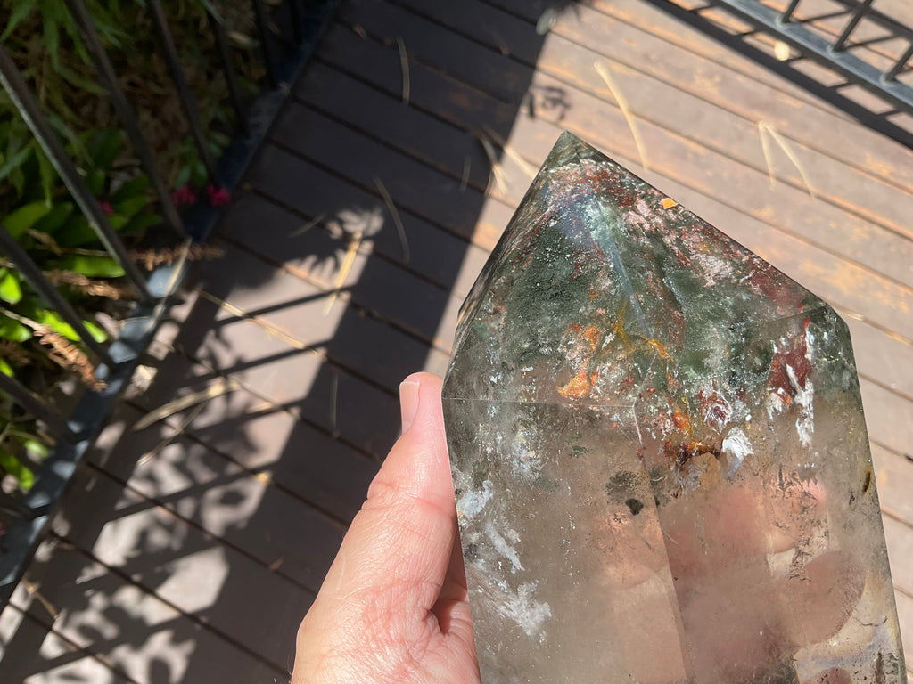 2788g XXL Garden Quartz Polished Point with custom wooden stand.