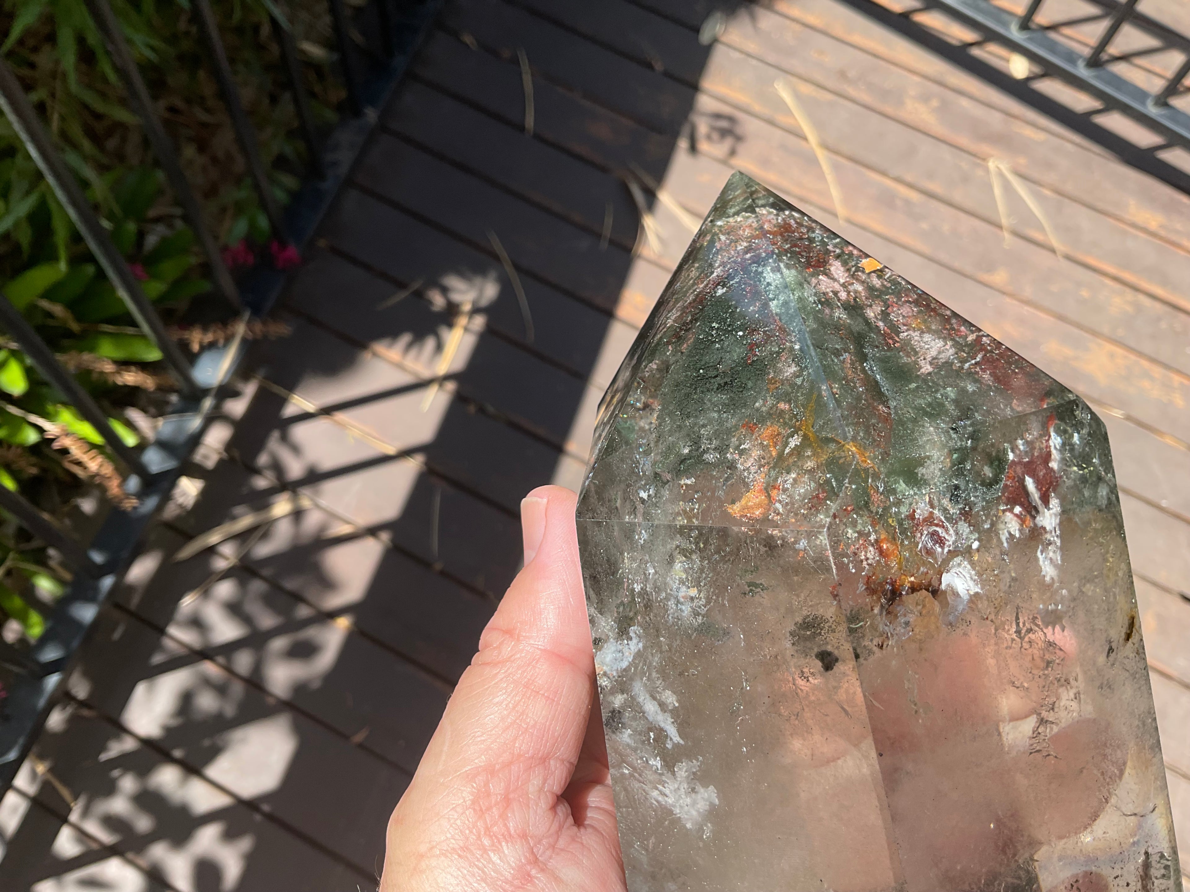 2788g XXL Garden Quartz Polished Point with custom wooden stand.