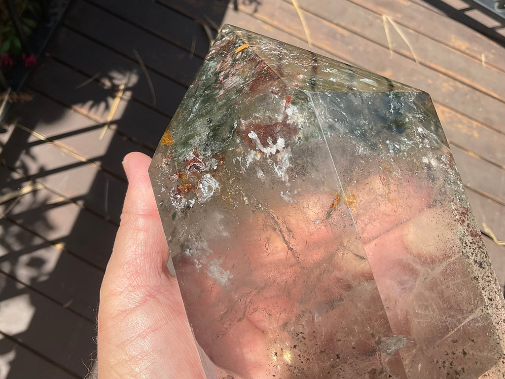 2788g XXL Garden Quartz Polished Point with custom wooden stand.