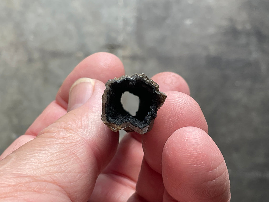 8g Stepped Brown Calcite Tube with Graphite Specimen 1B