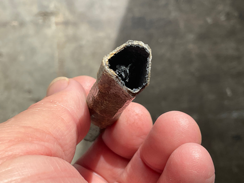12g Stepped Brown Calcite Tube with Graphite Specimen 3C