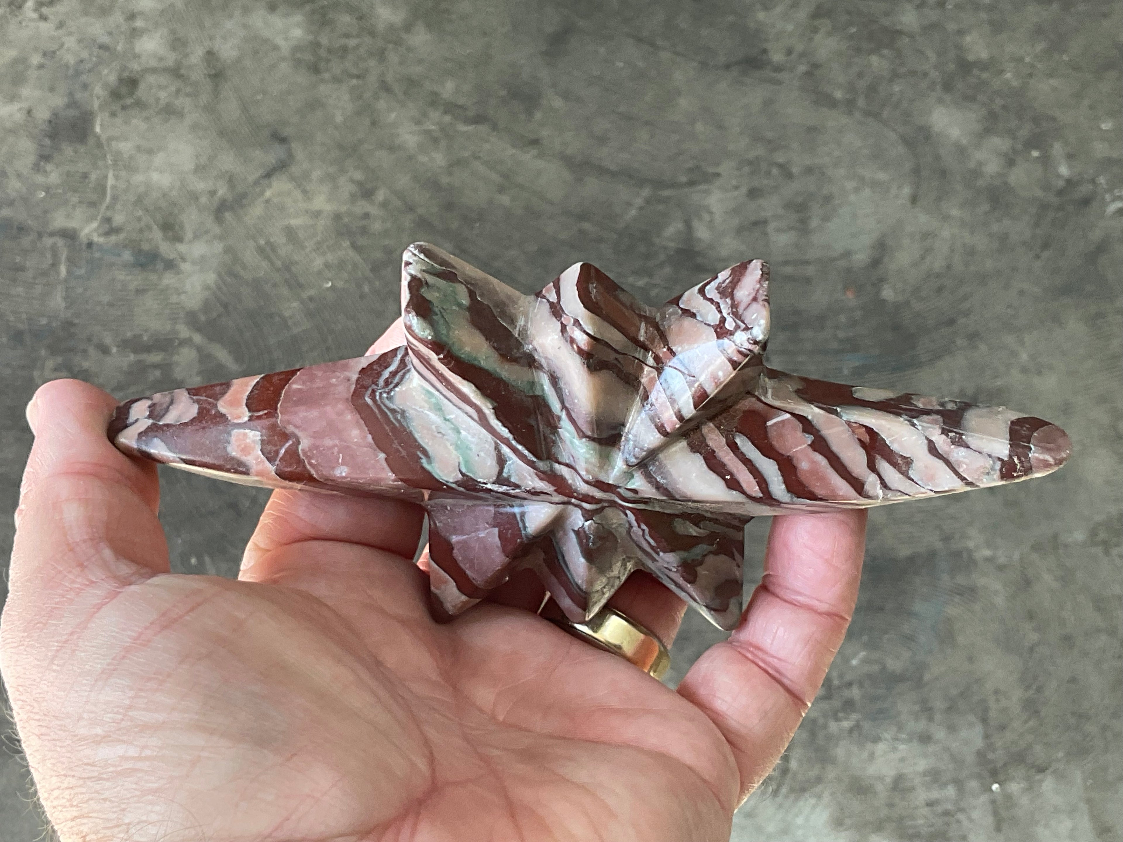 194g Striped Jasper Polaris Carving with Custom Wooden Stand 1