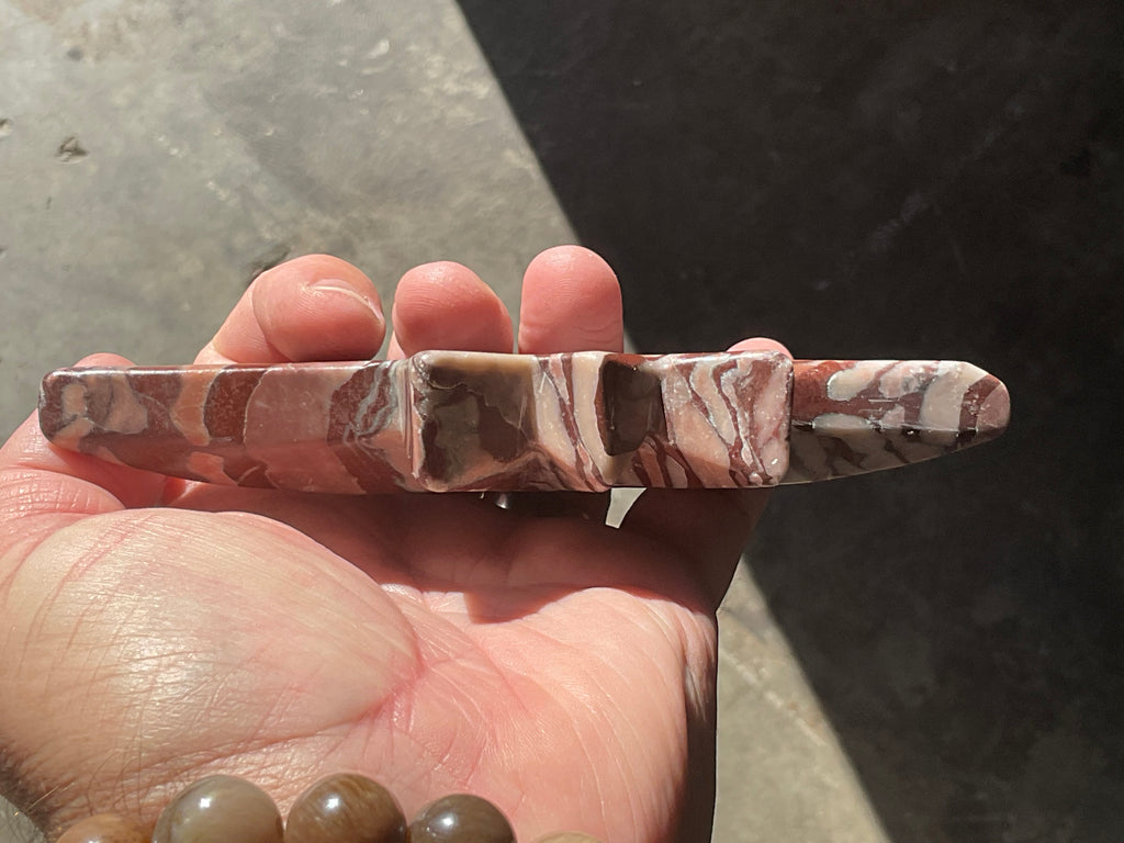 194g Striped Jasper Polaris Carving with Custom Wooden Stand 1