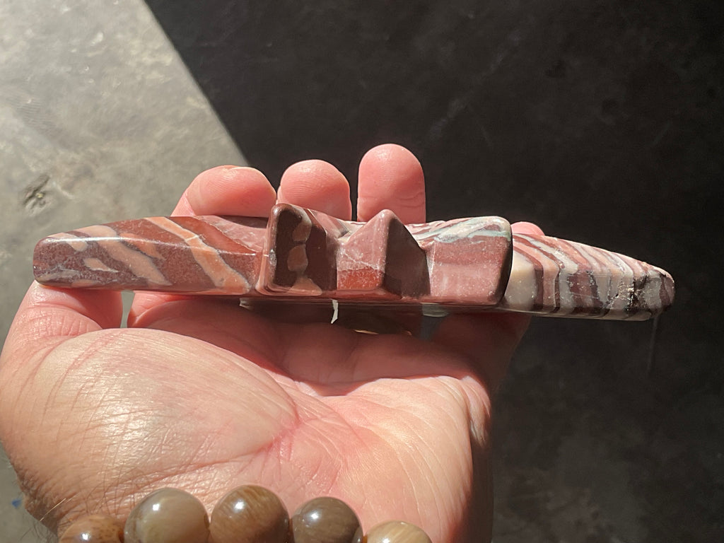 194g Striped Jasper Polaris Carving with Custom Wooden Stand 1