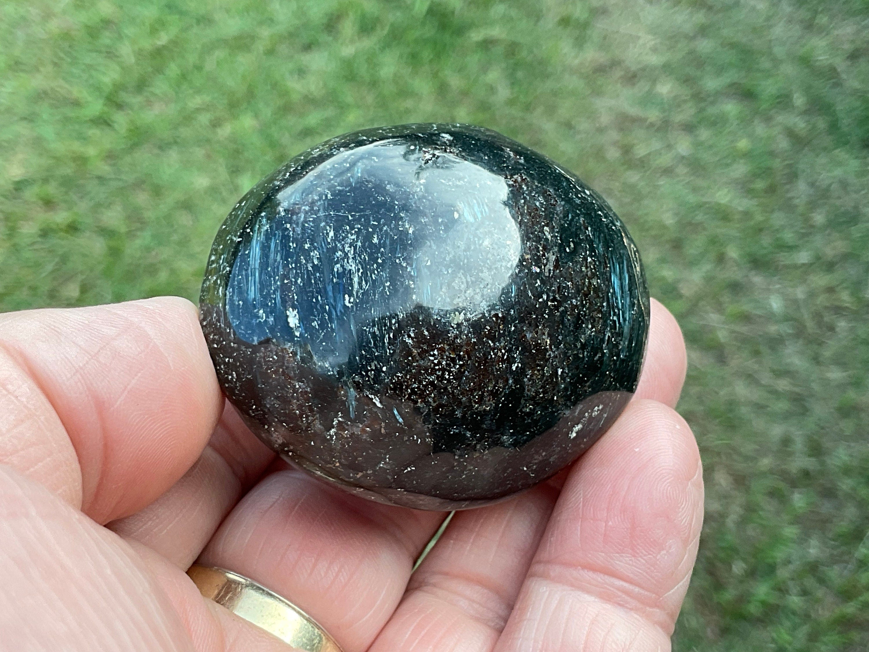 104g Arfvedsonite with Eudialyte Palmstone 6A