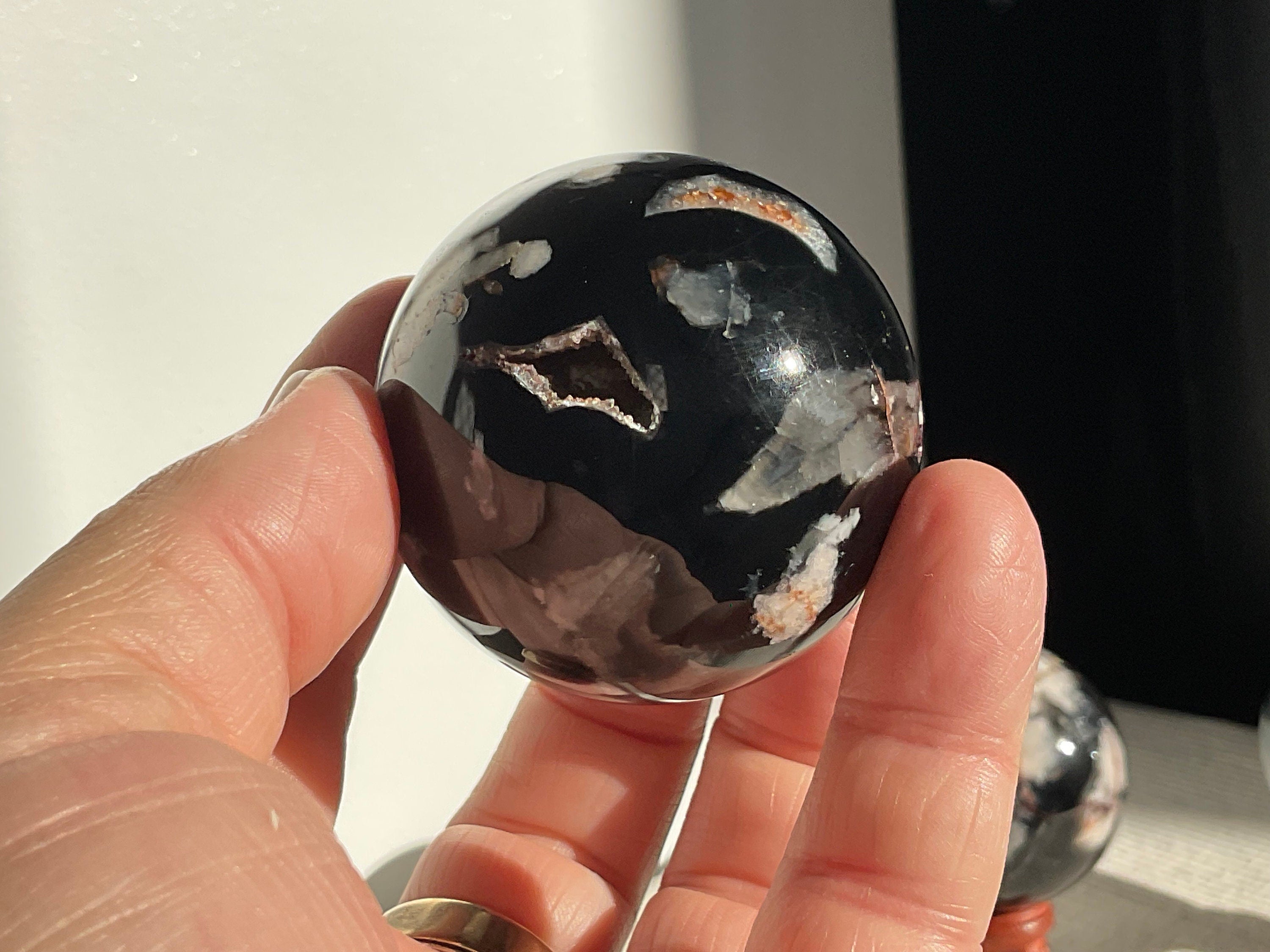 169g Black Flower Agate Sphere 2A