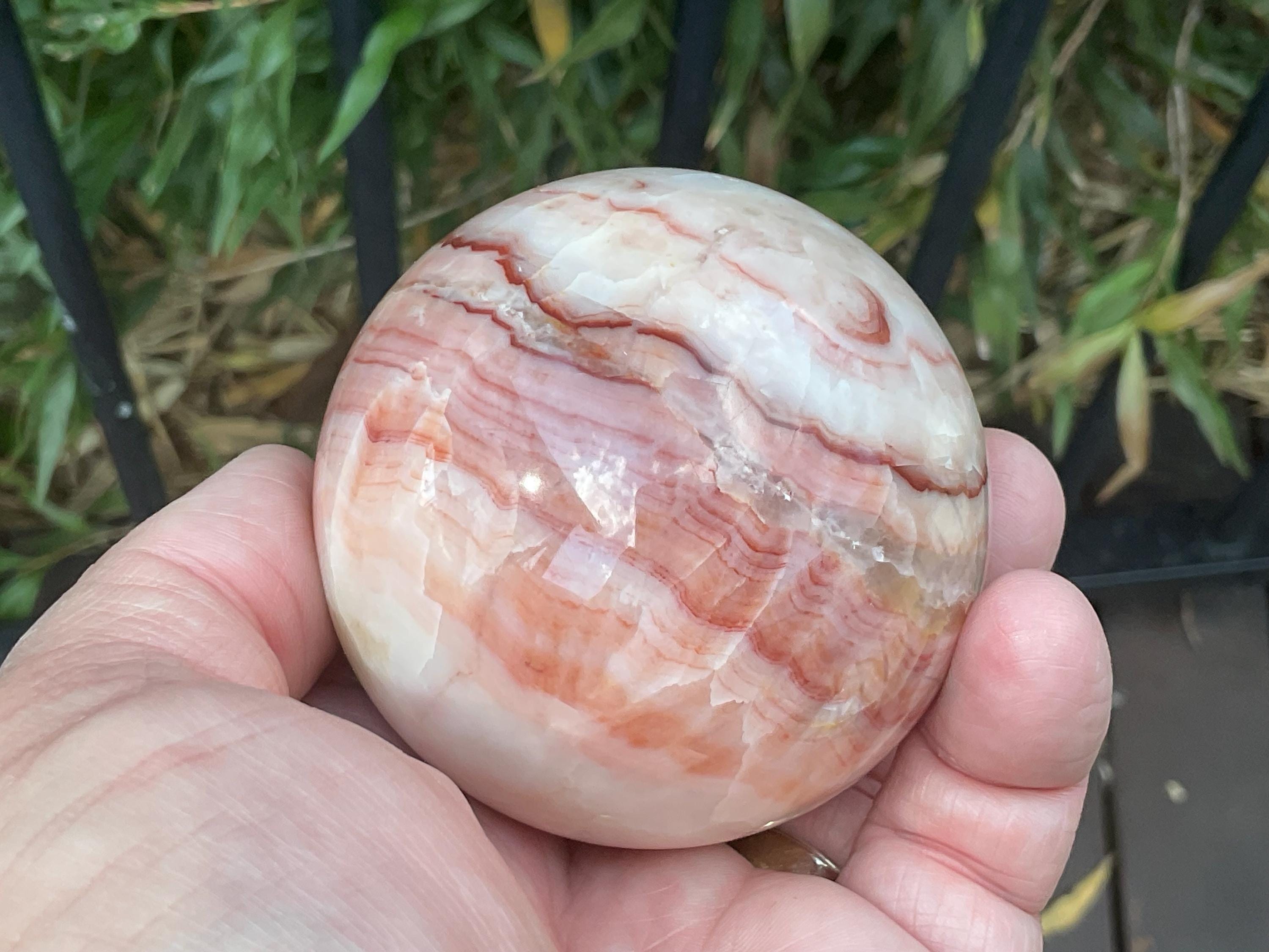 390g (6cm diameter) Red Banded Calcite Sphere B