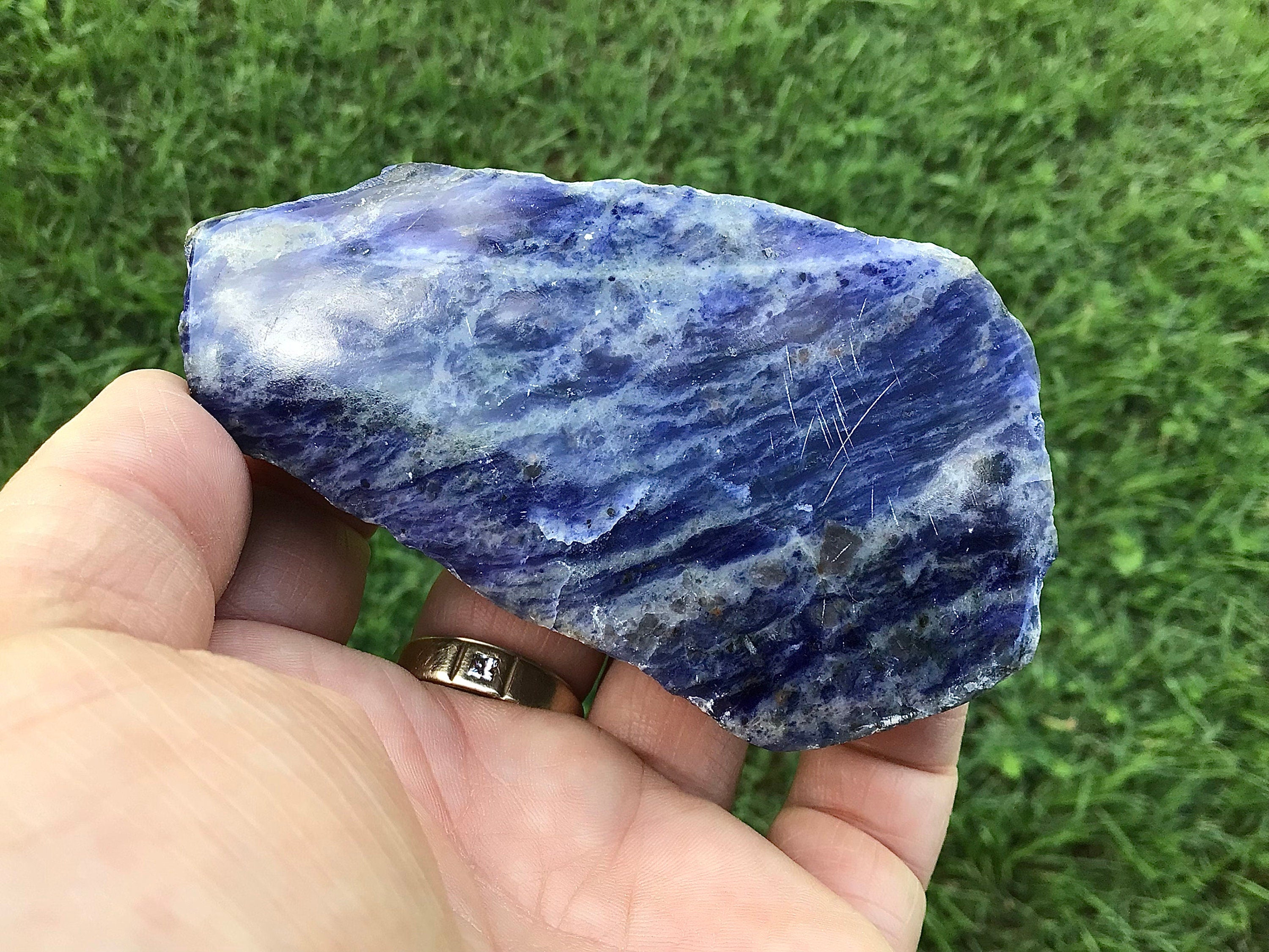 195g Sodalite with Graphite One Side Polished 1C