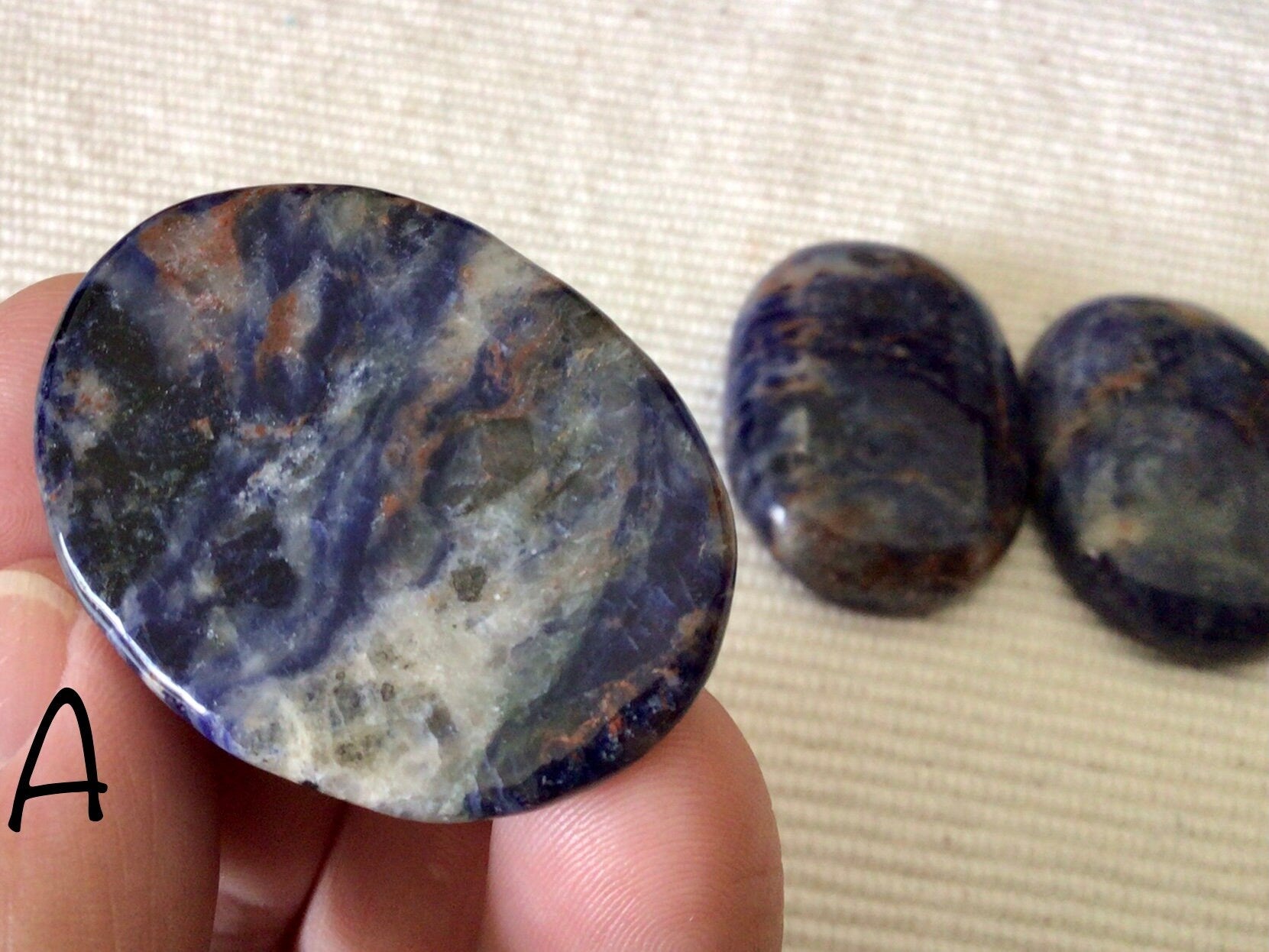 Sunset Sodalite Thumb Stone Group 10