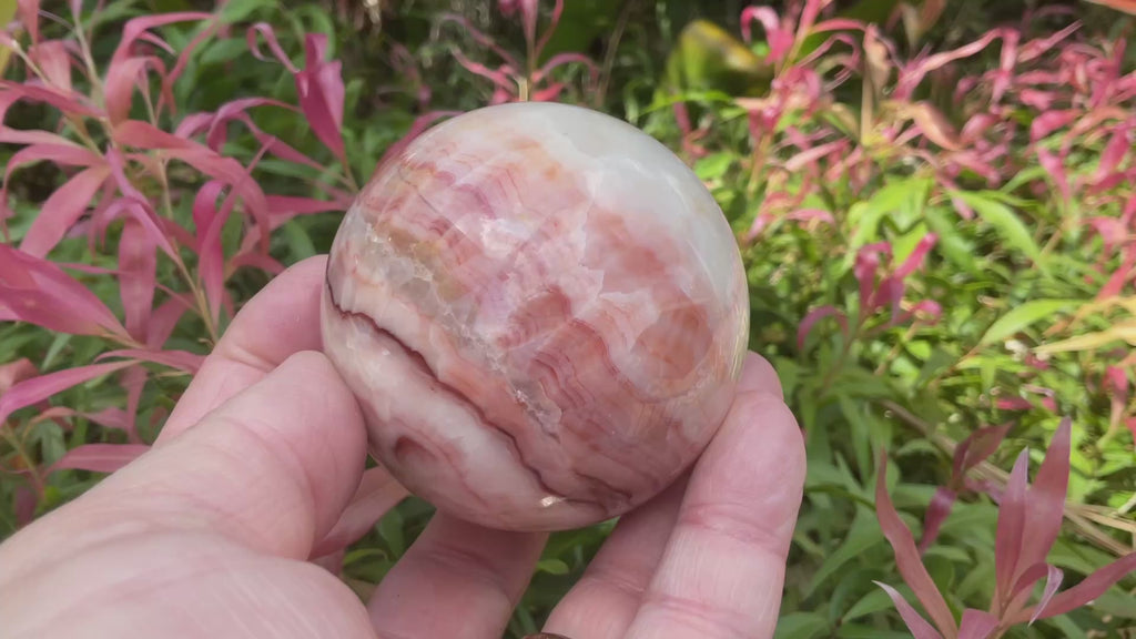 390g (6cm diameter) Red Banded Calcite Sphere B